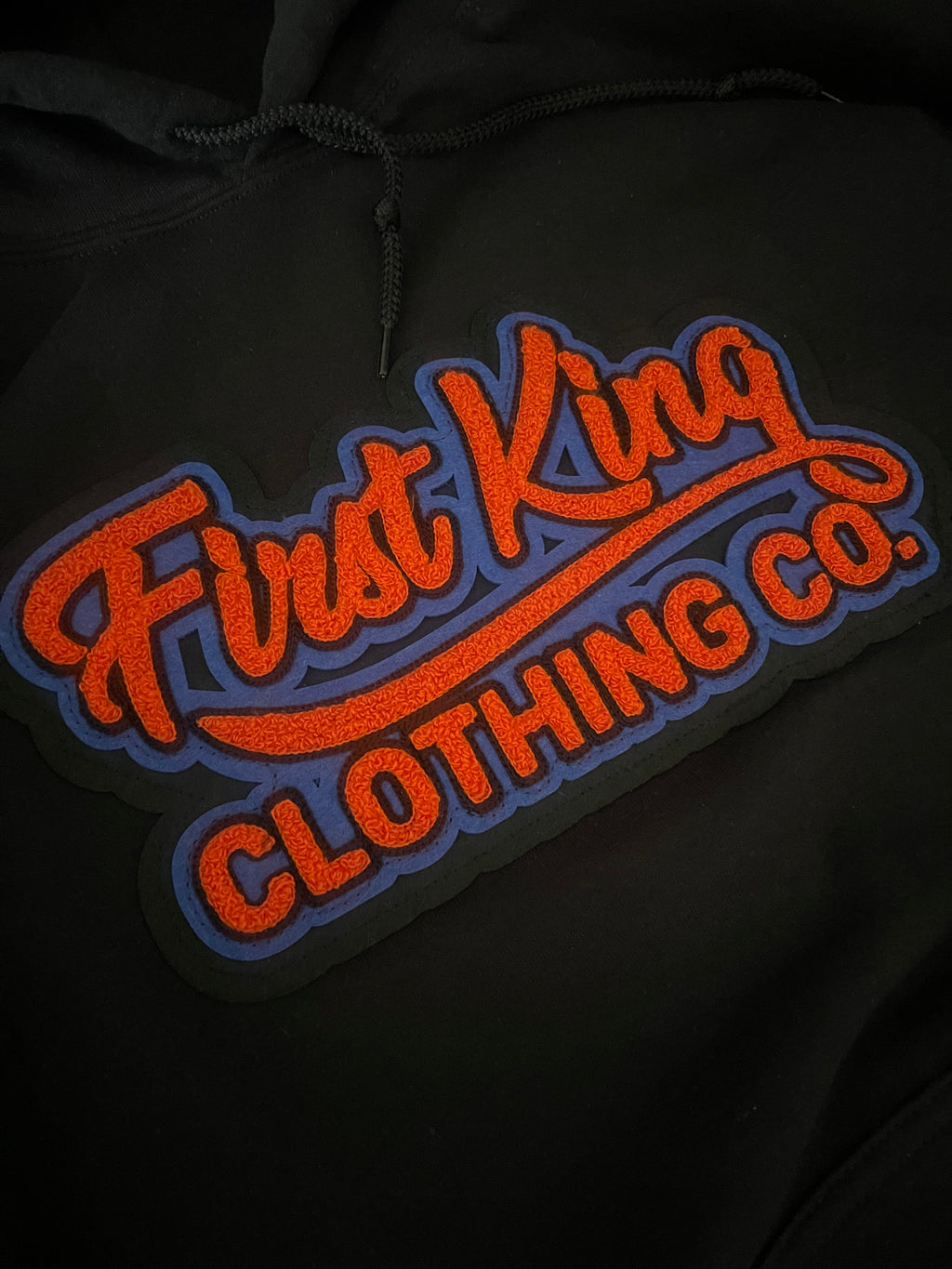 First King Black Hoodie With Royal Blue And Orange Chenille Patch